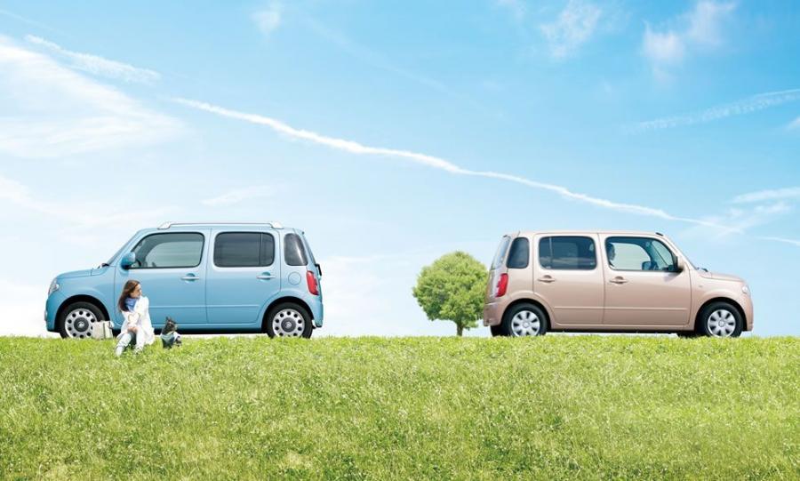  Daihatsu Mira Cocoa 2010 года  (фото 15 из 20)